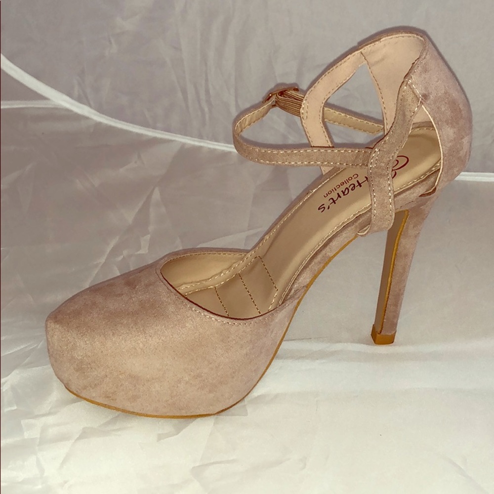 Size 7 hearts collection nude ankle strap heals.